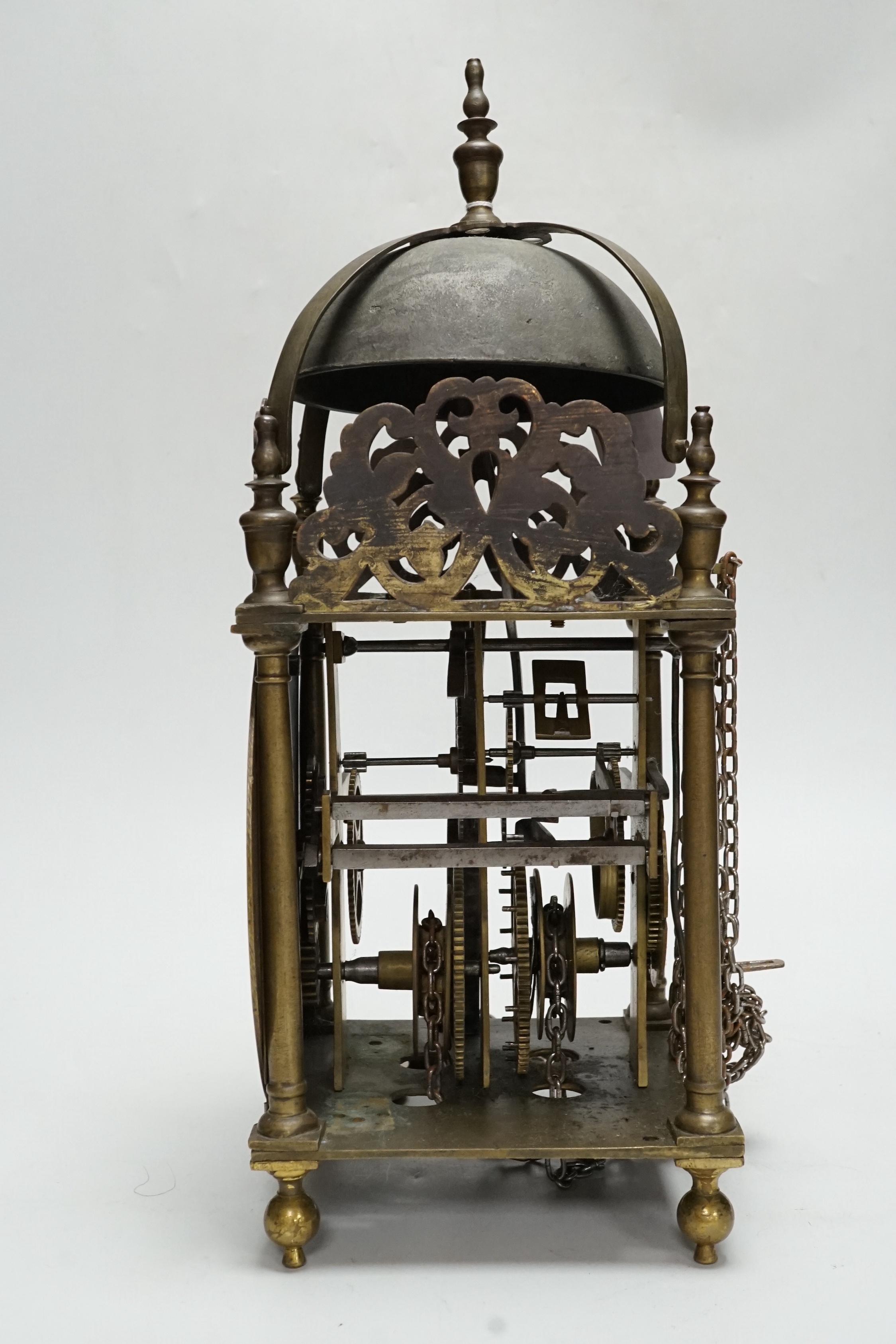 An 18th century and later brass lantern clock, 38cm